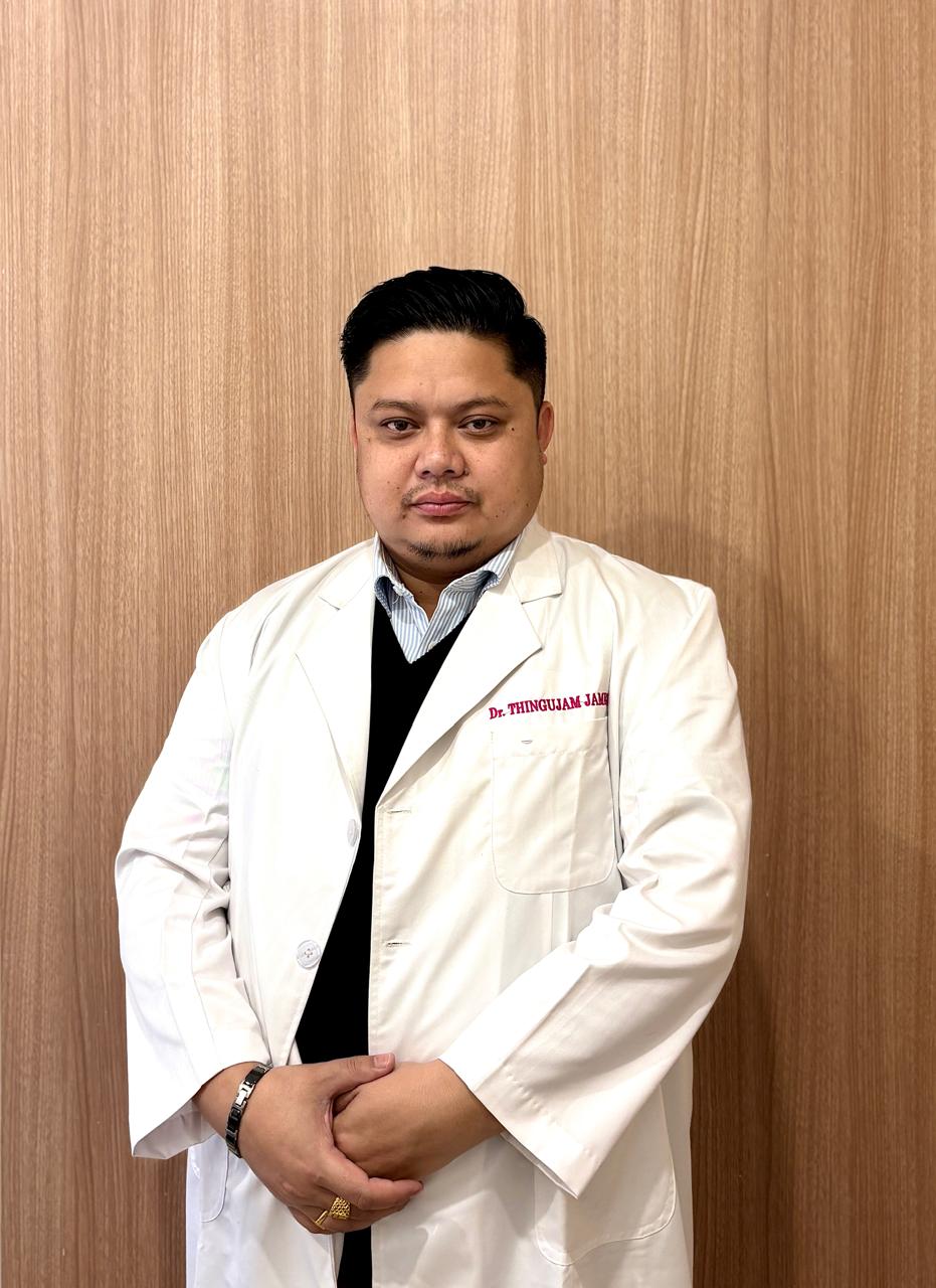 Dr.Thingujam James